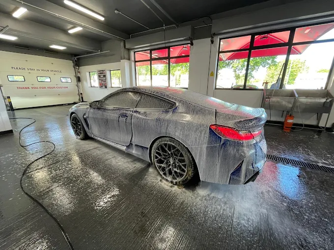 BMW M8 covered in foam at Lode Lane